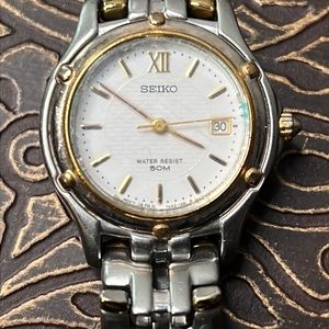 SEIKO Silver and Gold toned watch Water Resistant to 50 M